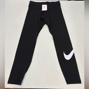 NIKE black leggings size medium no pockets NWT tight fit mid rise full length